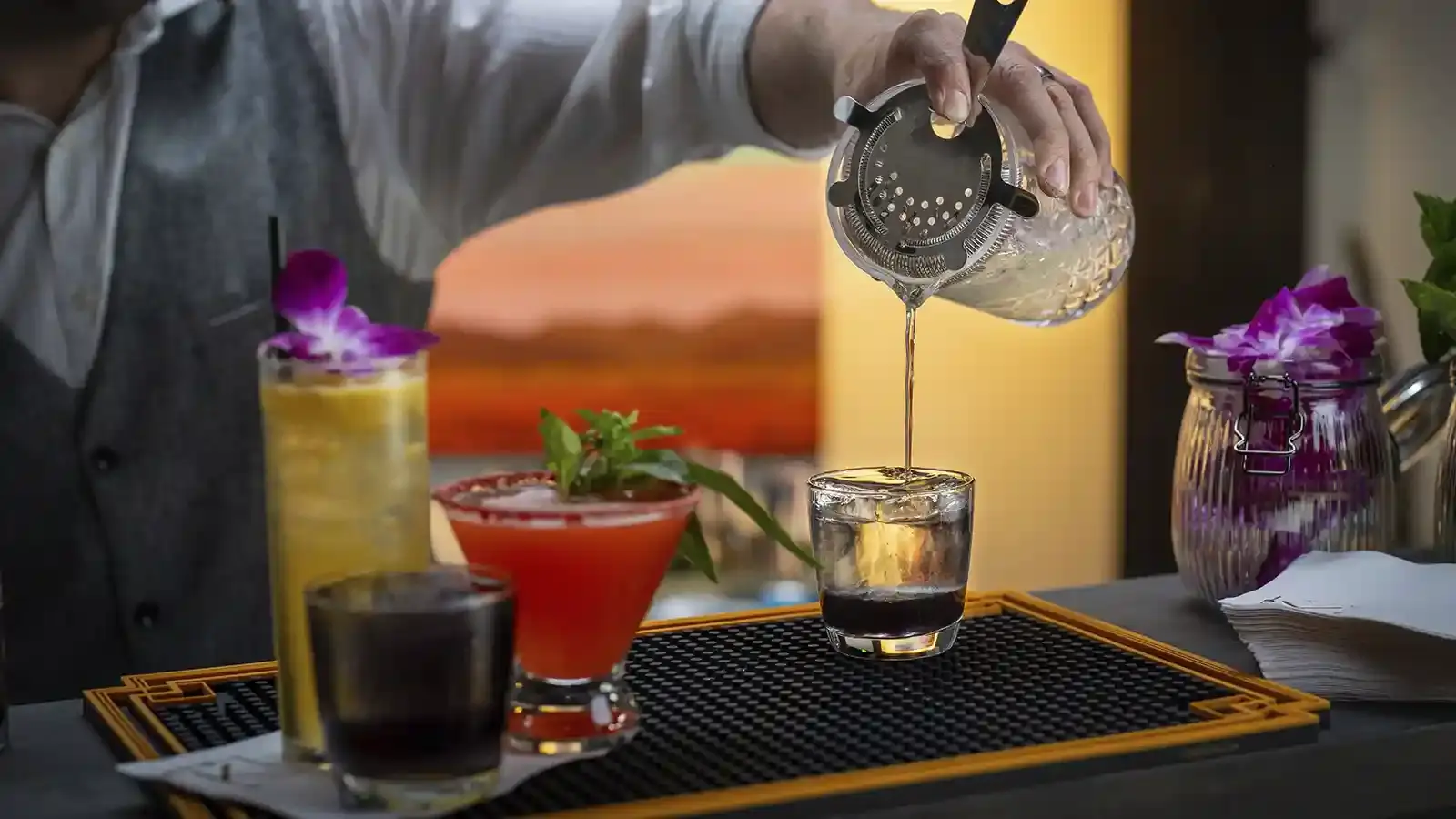 A Tipsy Tiger bartender crafting signature cocktails at an event