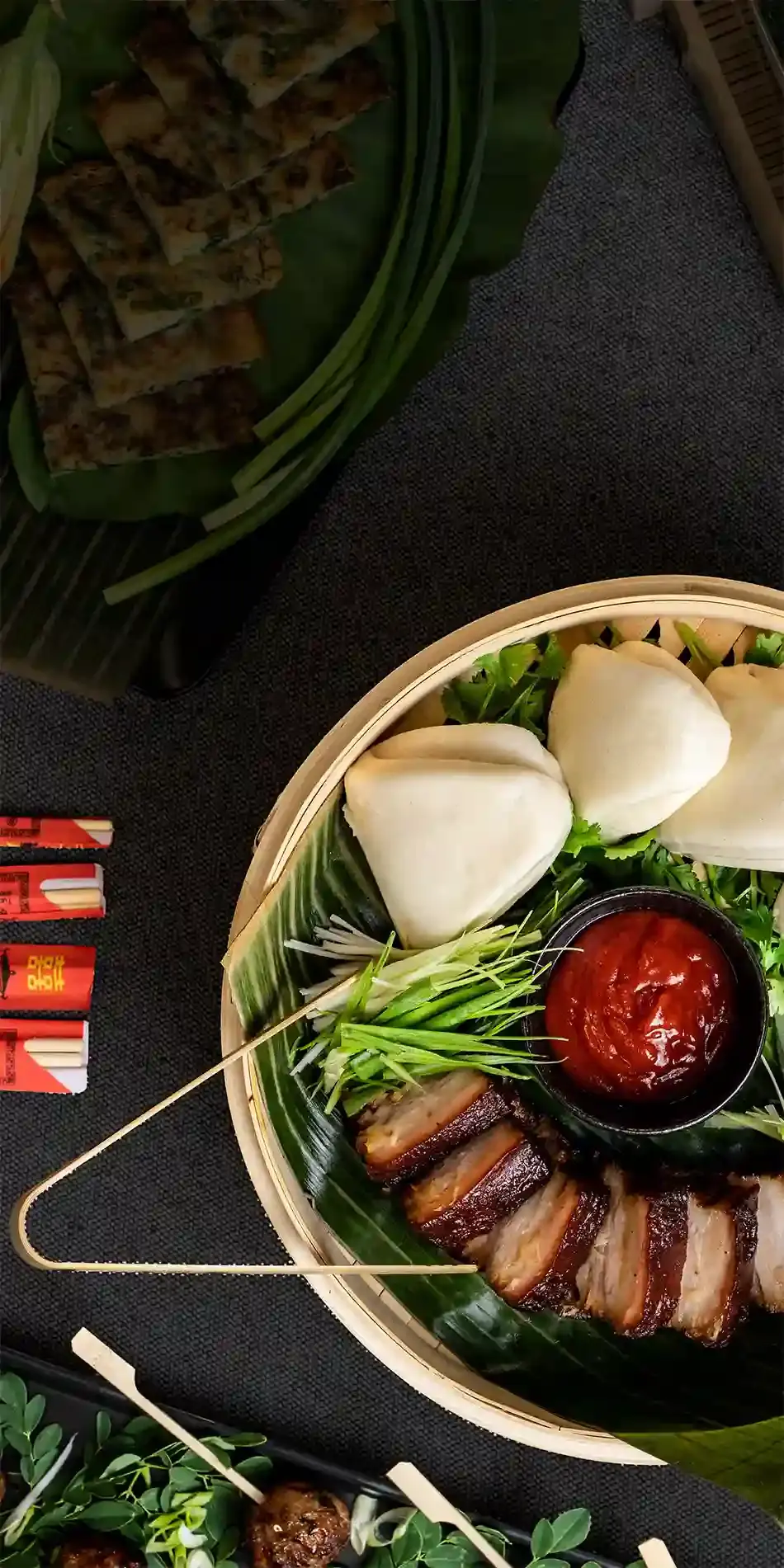 A picture of a table set with delicious asian-fusion food from K Catering