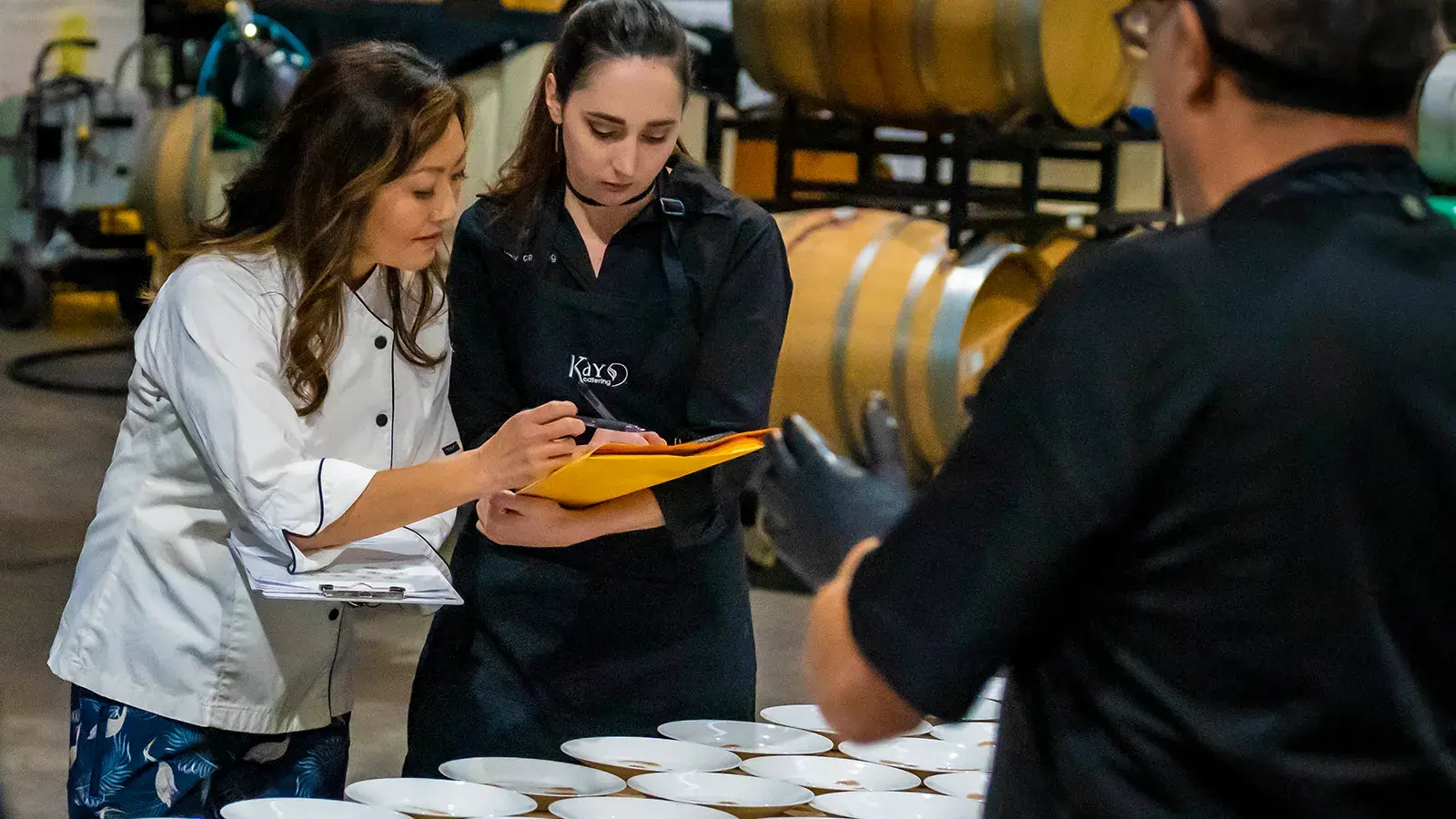 A happy couple eating at a K Catering event.