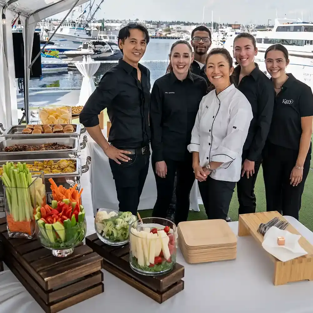K Catering staff with their buffet set out on a private ferry